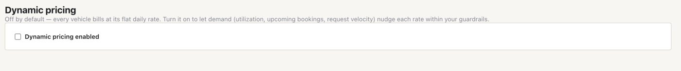 The Dynamic pricing page states plainly that it is off by default and every vehicle bills at its flat daily rate until you enable it.