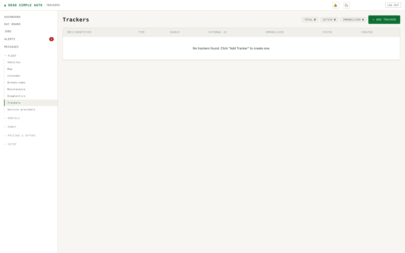 The Trackers page before any device is registered — one row per physical device once added, with identifier, type, data source, external ID, immobiliser capability and status, and counters for total, active and immobiliser-equipped devices.